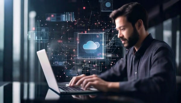 man at keyboard implementing cloud security tools 